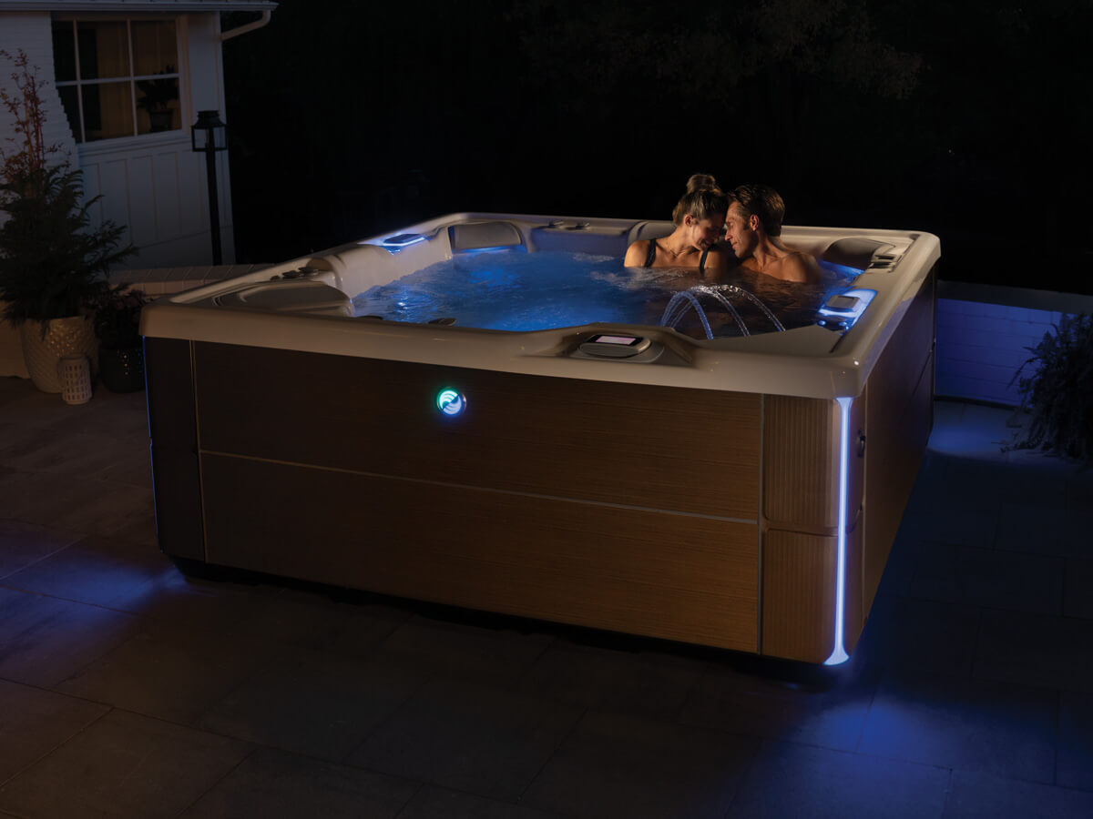 Couple spending quality time together in Vanguard Hot Tub Spa | Hot Springs Spas available at the Recreational Warehouse Southwest Florida (Naples, Fort Myers and Port Charlotte Locations) Pool Warehouse
