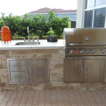 Custom outdoor kitchen with Bull built-in grill in Southwest Florida from The Recreational Warehouse Southwest Florida's Leading Warehouse for Spas, Hot Tubs, Pool Heaters, Pool Supplies, Outdoor Kitchens and more!